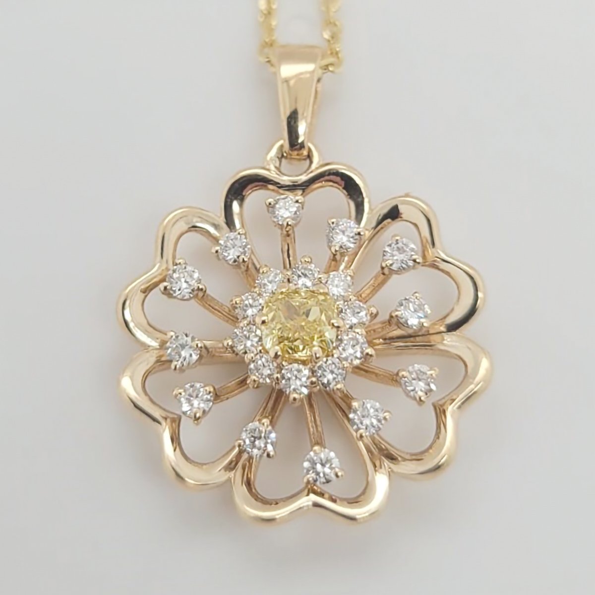 Pendant: 0.38 Fancy Vivid Yellow Diamond, and more